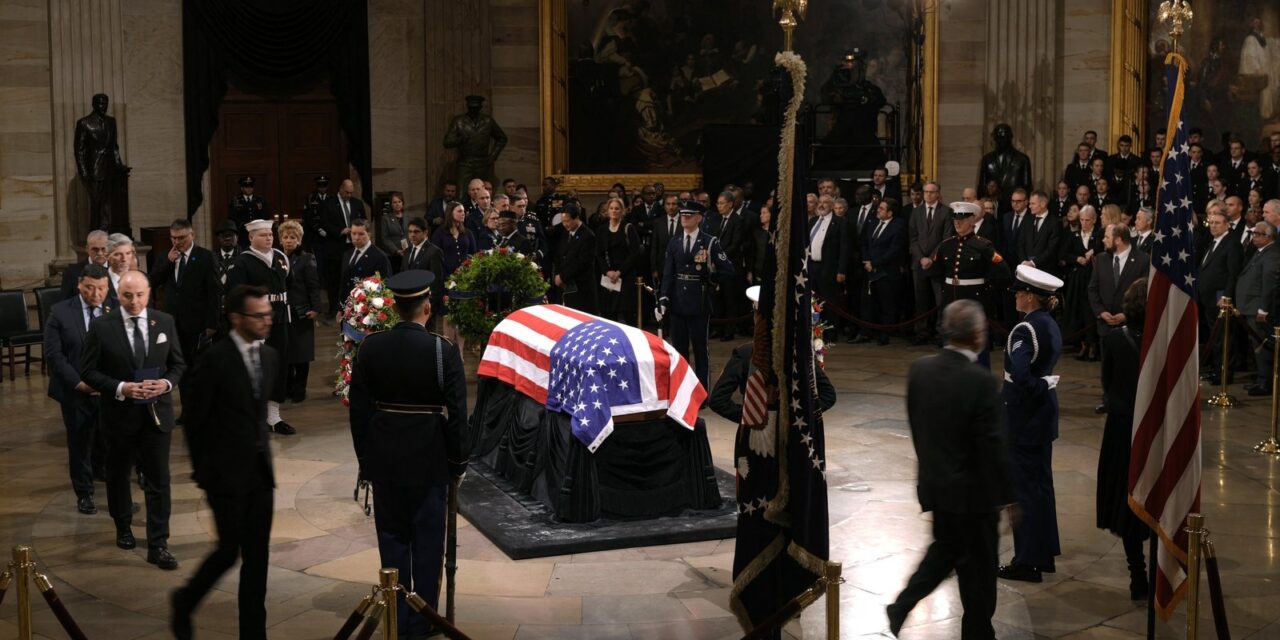 Former US president Carter lies in state after procession