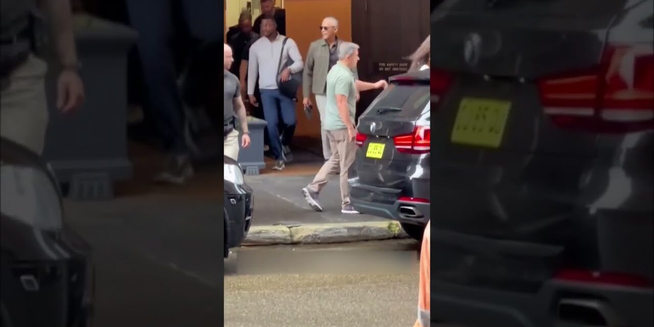 Secret Service moves President Obama and Michelle Obama to a Waiting Motorcade